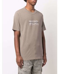 beige bedrucktes T-Shirt mit einem Rundhalsausschnitt von Diesel