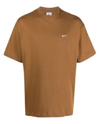 beige bedrucktes T-Shirt mit einem Rundhalsausschnitt von Nike