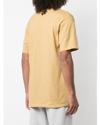 beige bedrucktes T-Shirt mit einem Rundhalsausschnitt von Stussy