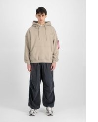 beige Pullover mit einem Kapuze von Alpha Industries