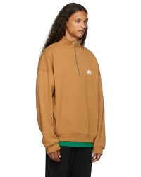 beige Pullover mit einem Reißverschluss am Kragen von M.A. Martin Asbjorn