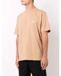 beige T-Shirt mit einem Rundhalsausschnitt von Stussy