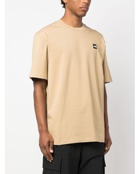 beige T-Shirt mit einem Rundhalsausschnitt von The North Face