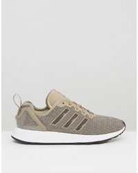 beige Turnschuhe von adidas