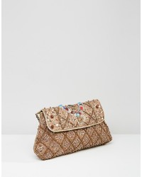 beige verzierte Clutch von Raga