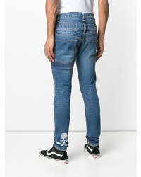 blaue bedruckte enge Jeans von Mastermind World