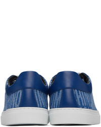 blaue bedruckte Jeans niedrige Sneakers von Moschino