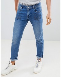 blaue bedruckte Jeans von ASOS DESIGN