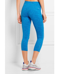 blaue bedruckte Leggings von Nike