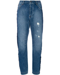 blaue beschlagene Jeans