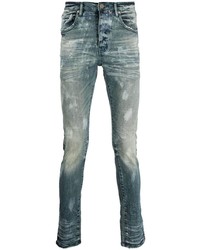 blaue enge Jeans mit Acid-Waschung