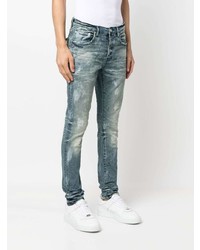 blaue enge Jeans mit Acid-Waschung von purple brand