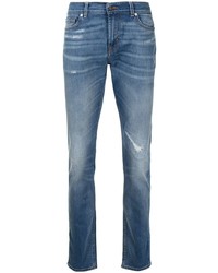 blaue enge Jeans mit Destroyed-Effekten von 7 For All Mankind