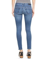 blaue enge Jeans mit Destroyed-Effekten von AG Jeans