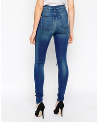 blaue enge Jeans mit Destroyed-Effekten von Monroe