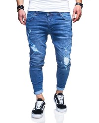 blaue enge Jeans mit Destroyed-Effekten von behype