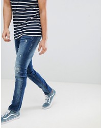 blaue enge Jeans mit Destroyed-Effekten von BLEND