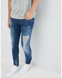 blaue enge Jeans mit Destroyed-Effekten von BLEND