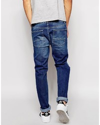 blaue enge Jeans mit Destroyed-Effekten von Asos