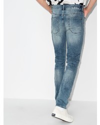 blaue enge Jeans mit Destroyed-Effekten von Ksubi