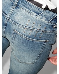 blaue enge Jeans mit Destroyed-Effekten von Ksubi