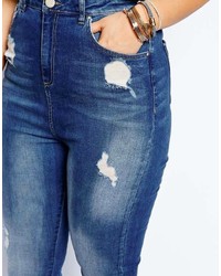 blaue enge Jeans mit Destroyed-Effekten von Asos