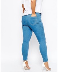 blaue enge Jeans mit Destroyed-Effekten von Asos