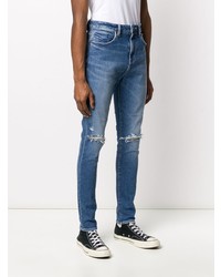 blaue enge Jeans mit Destroyed-Effekten von Neuw