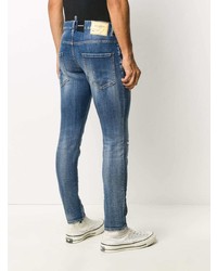 blaue enge Jeans mit Destroyed-Effekten von DSQUARED2