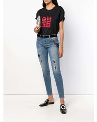 blaue enge Jeans mit Destroyed-Effekten von Boutique Moschino