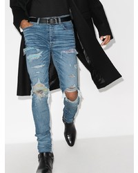 blaue enge Jeans mit Destroyed-Effekten von Amiri