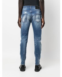 blaue enge Jeans mit Destroyed-Effekten von John Richmond