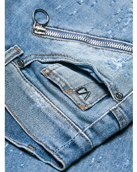 blaue enge Jeans mit Destroyed-Effekten von Versace Jeans