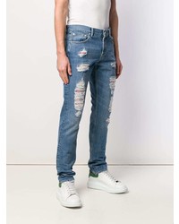 blaue enge Jeans mit Destroyed-Effekten von Alexander McQueen