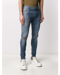 blaue enge Jeans mit Destroyed-Effekten von Balmain