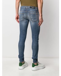 blaue enge Jeans mit Destroyed-Effekten von Balmain