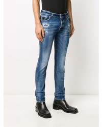 blaue enge Jeans mit Destroyed-Effekten von John Richmond