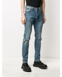 blaue enge Jeans mit Destroyed-Effekten von Philipp Plein