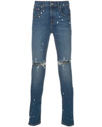 blaue enge Jeans mit Destroyed-Effekten von DOMREBEL