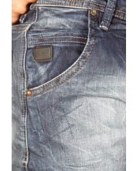 blaue enge Jeans mit Destroyed-Effekten von EX-PENT