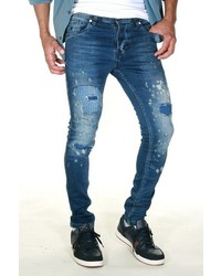 blaue enge Jeans mit Destroyed-Effekten von EX-PENT