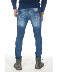 blaue enge Jeans mit Destroyed-Effekten von EX-PENT