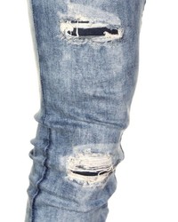 blaue enge Jeans mit Destroyed-Effekten von EX-PENT