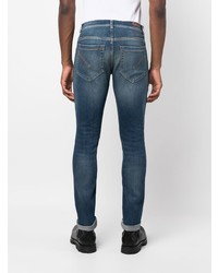 blaue enge Jeans mit Destroyed-Effekten von Dondup