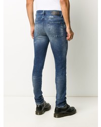 blaue enge Jeans mit Destroyed-Effekten von Diesel