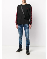 blaue enge Jeans mit Destroyed-Effekten von Philipp Plein