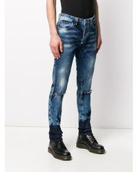 blaue enge Jeans mit Destroyed-Effekten von Philipp Plein