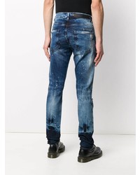 blaue enge Jeans mit Destroyed-Effekten von Philipp Plein