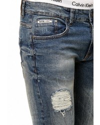 blaue enge Jeans mit Destroyed-Effekten von INDICODE