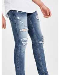 blaue enge Jeans mit Destroyed-Effekten von Jack & Jones